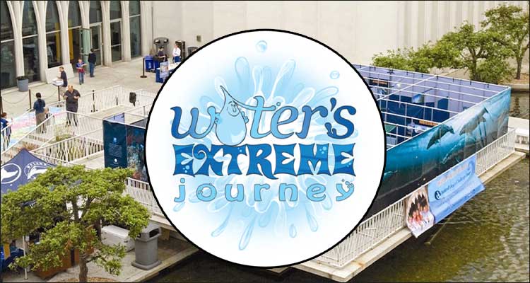 Water's Extreme Journey logo (text) over drone footage of attraction.